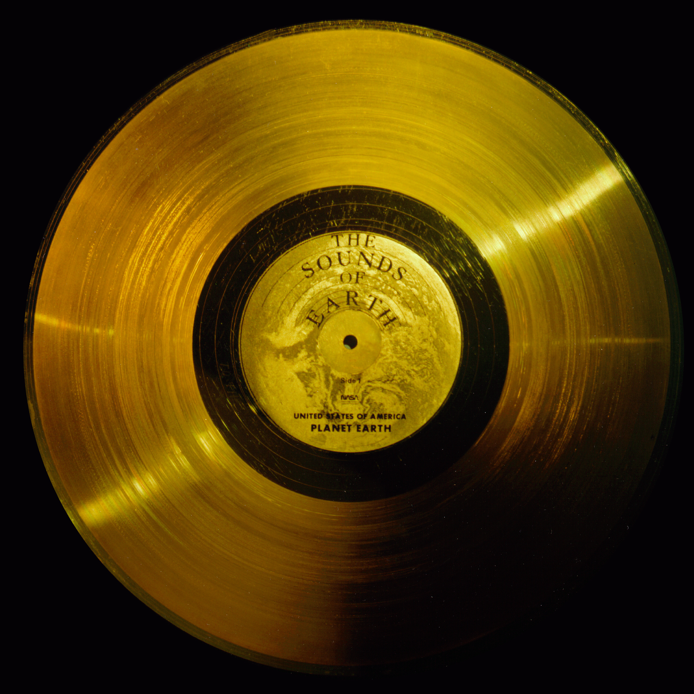 The front side of the Sounds of Earth golden vinyl record