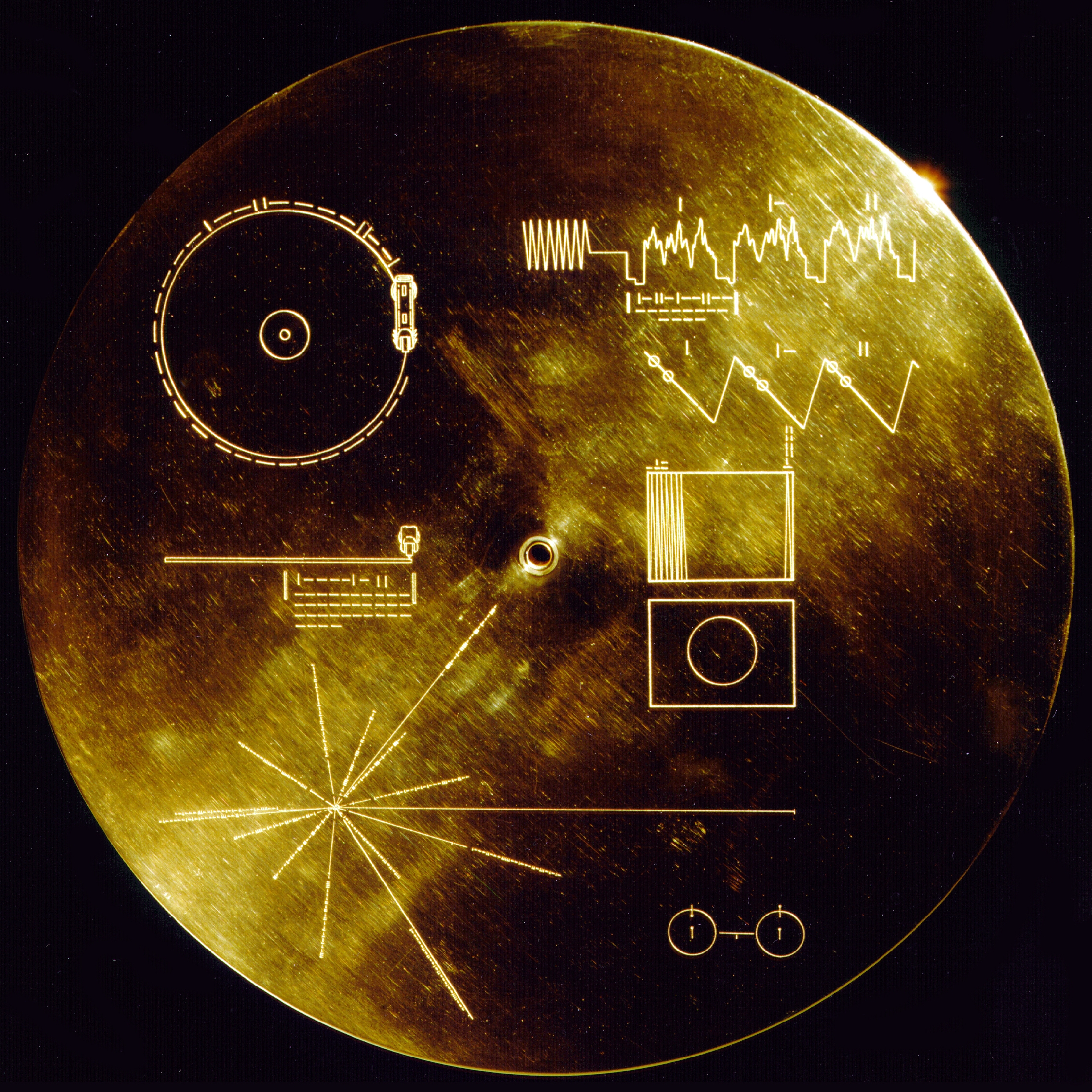 The backside of the Sounds of Earth record, engraved with nonverbal instructions and an abstract map of the solar system.